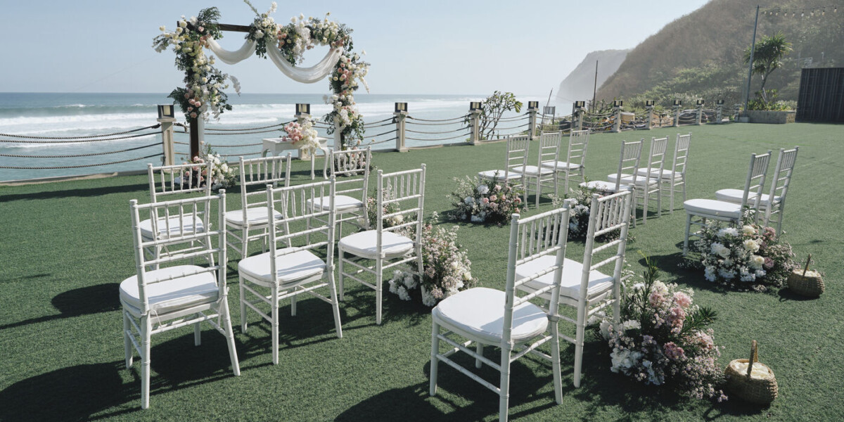 Ceremony on seaside lawn