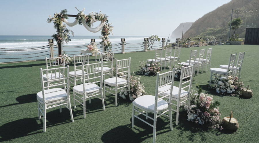 Ceremony on seaside lawn
